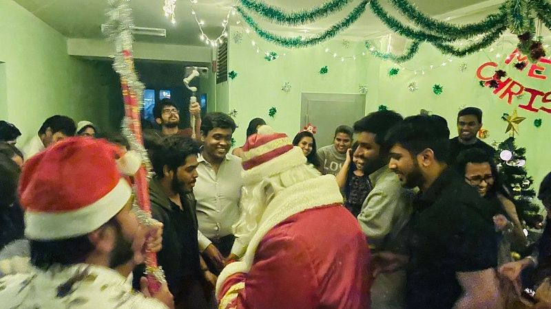New Year celebration. Santa Klaus in Hostel